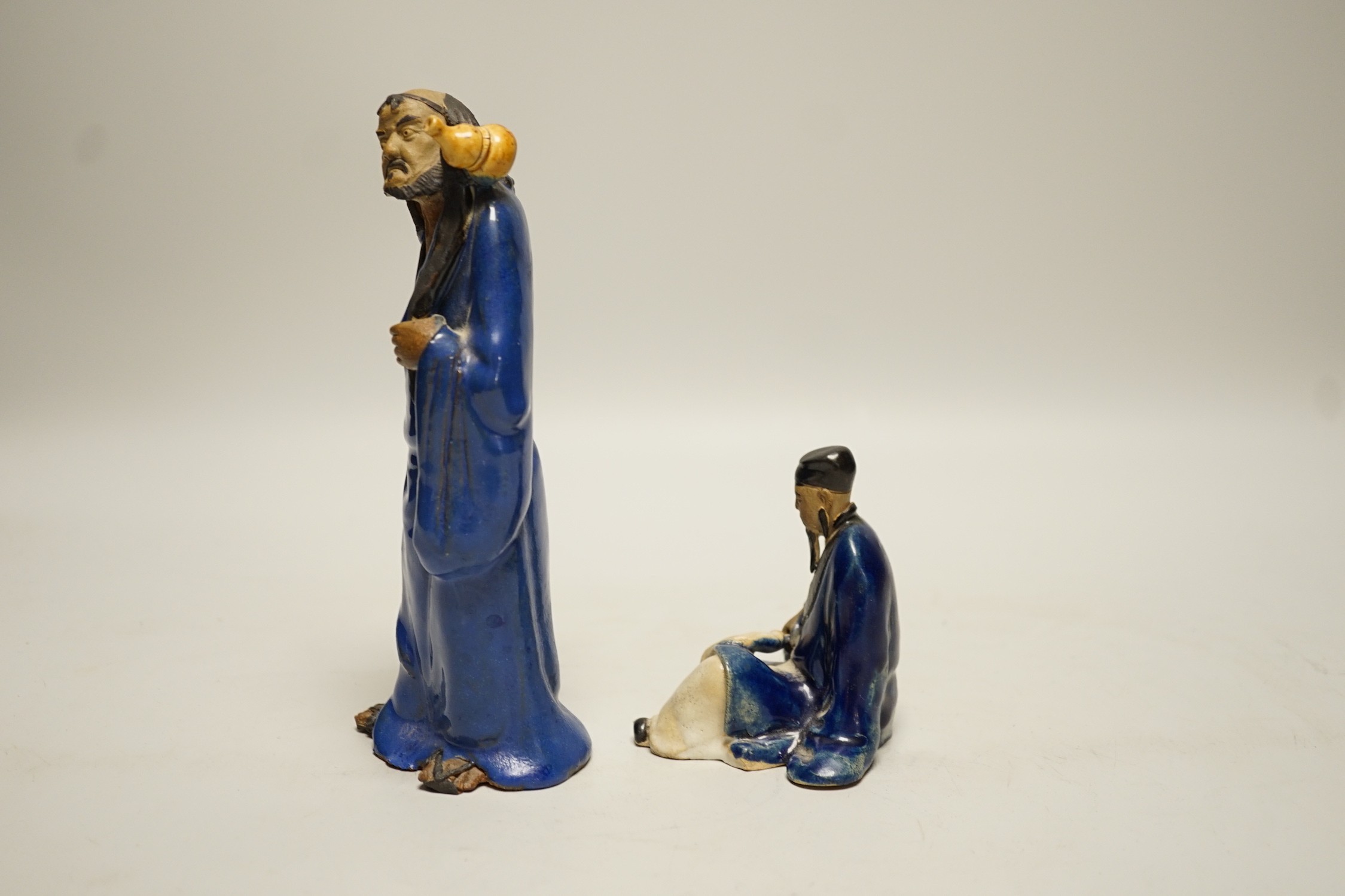 Two Chinese glazed pottery figures of Li Tieguai and Lu Dongbin, late 19th/early 20th century, largest 18cm